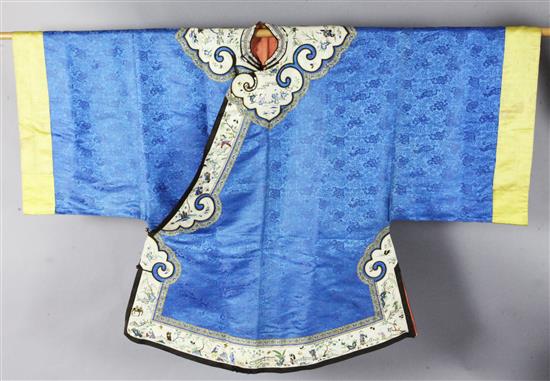 A Chinese embroidered blue silk brocade robe, early 20th century, length 99cm